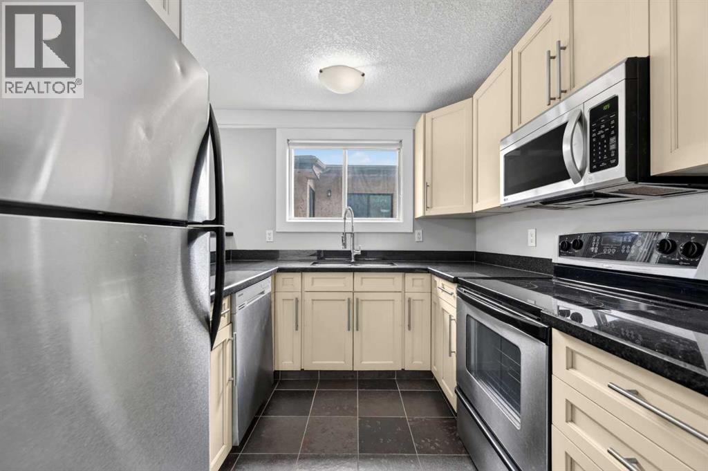 203, 644 Meredith Road NE