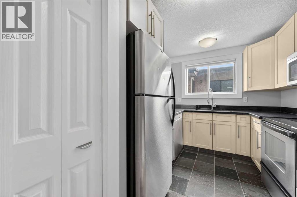 203, 644 Meredith Road NE