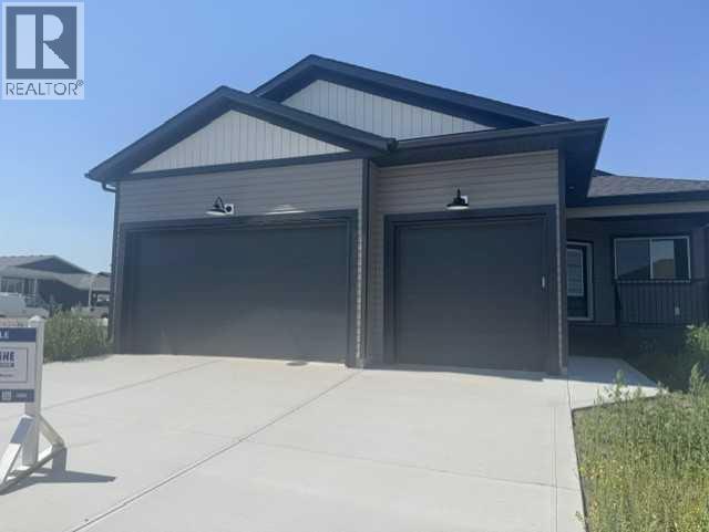 Photo 1 of 38 — 32 Sunrise Crescent N, Three Hills, AB T0M2A0