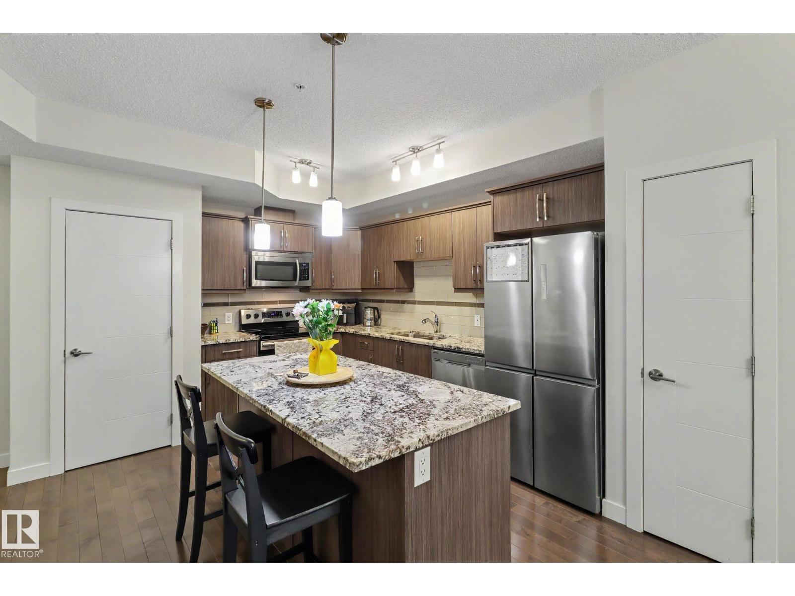 #315 10523 123 ST NW