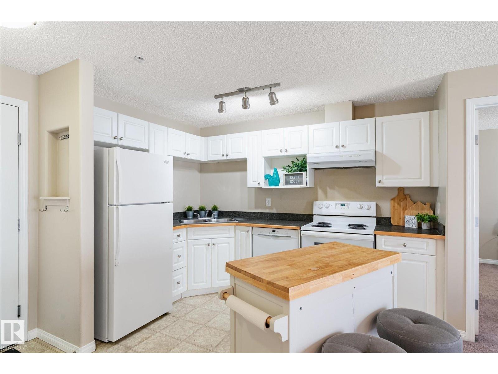 #203 155 EDWARDS DR SW