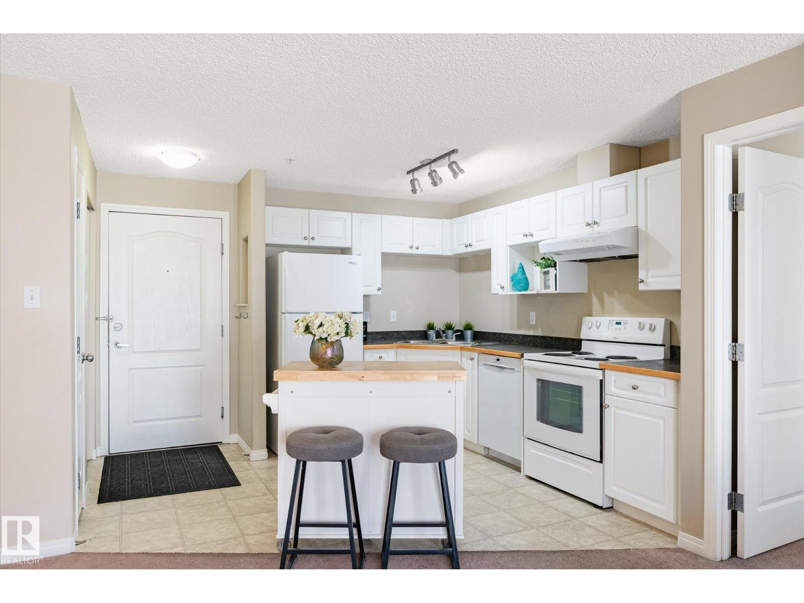 #203 155 EDWARDS DR SW