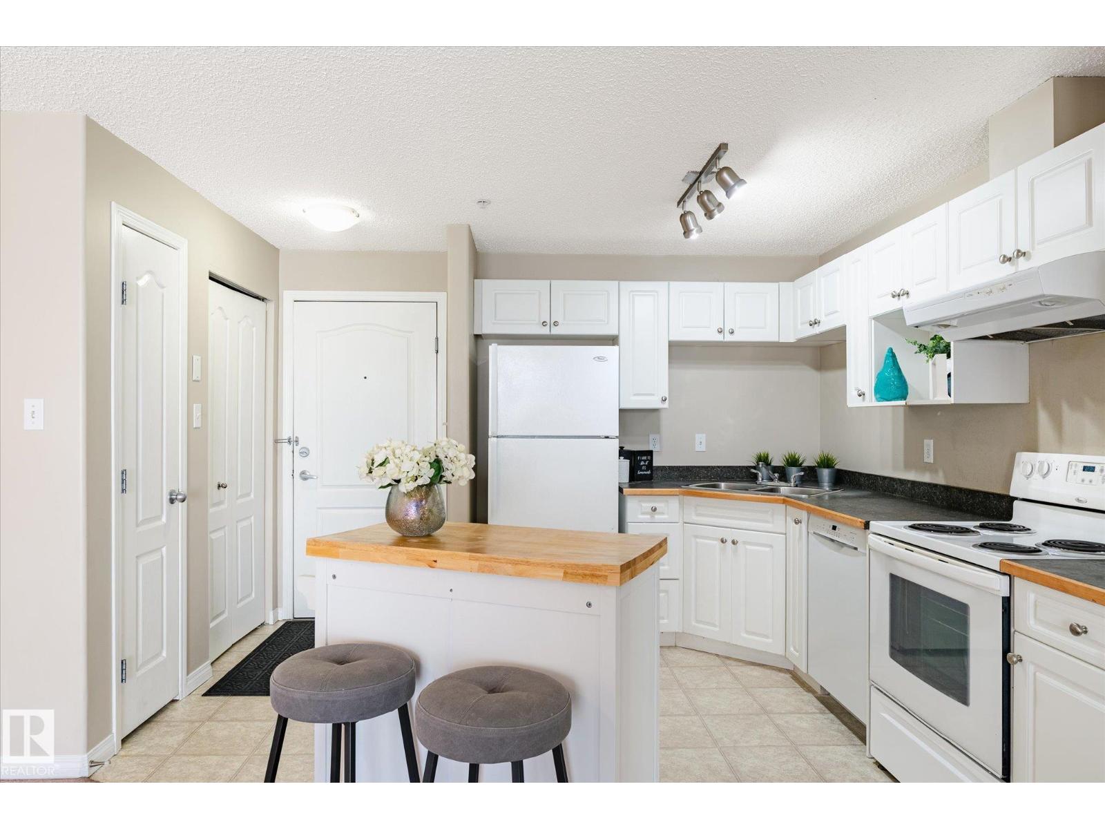 #203 155 EDWARDS DR SW