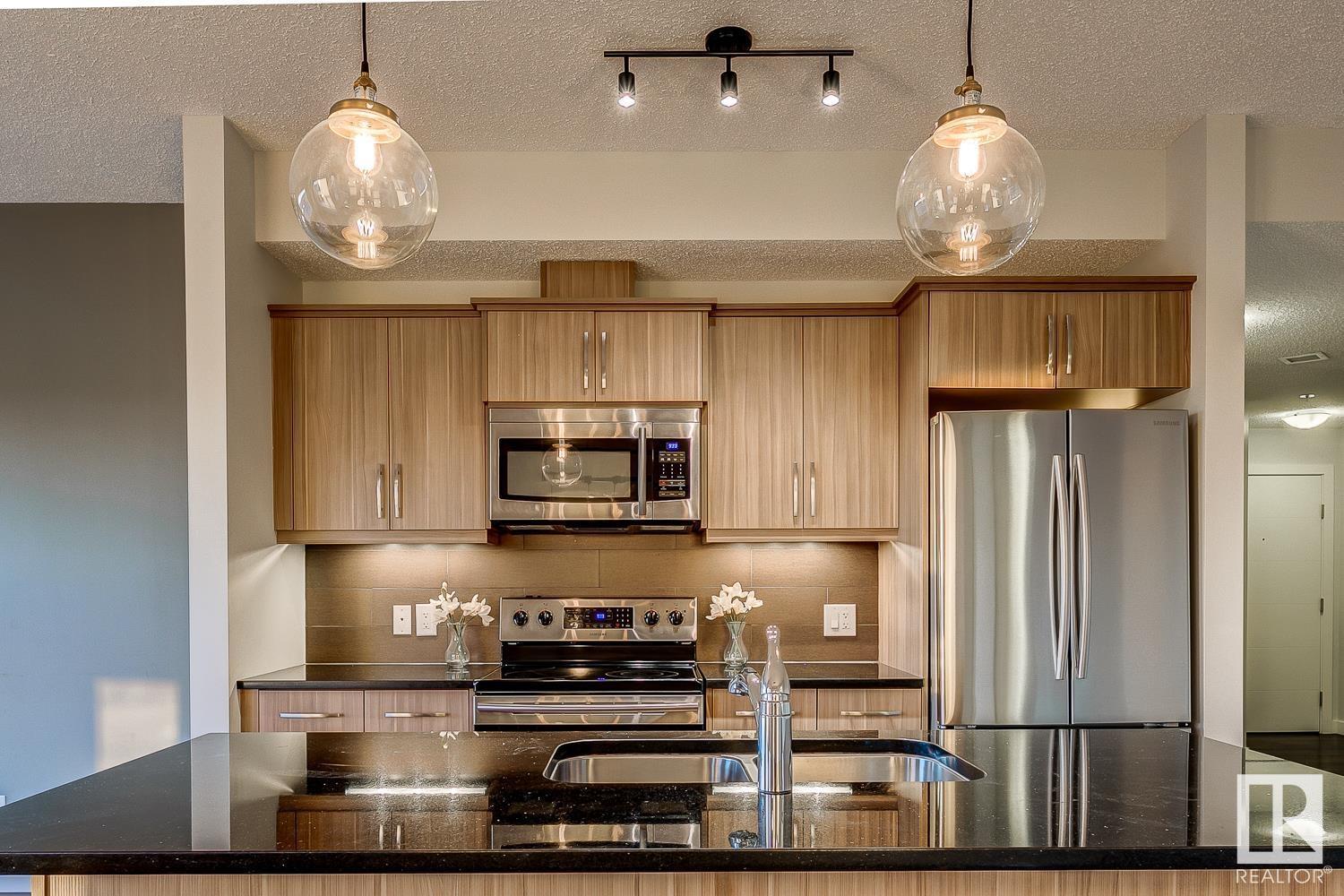 #407 10523 123 ST NW
