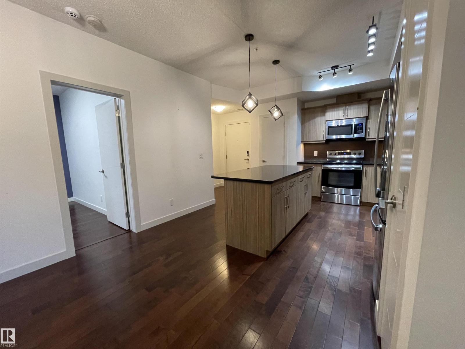 #115 10523 123 ST NW