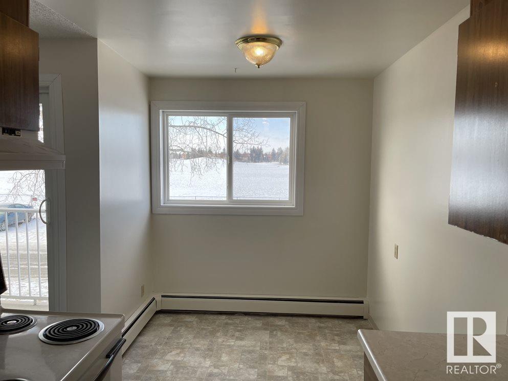 #32 11265 31 AV NW