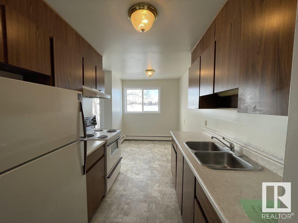 #32 11265 31 AV NW