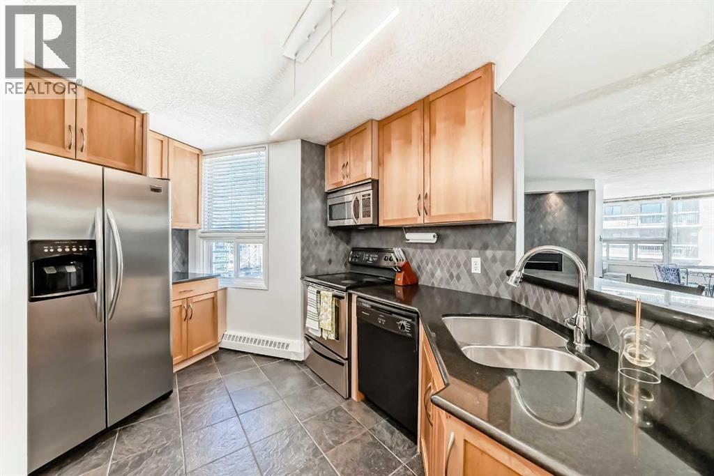 703, 626 15 Avenue SW