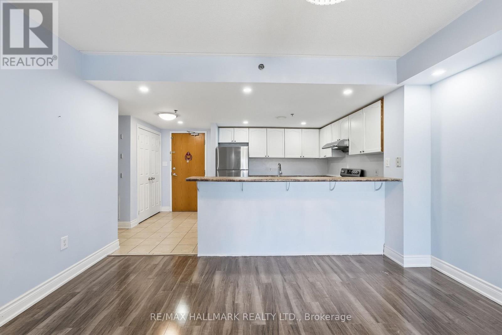 201 - 7428 MARKHAM ROAD