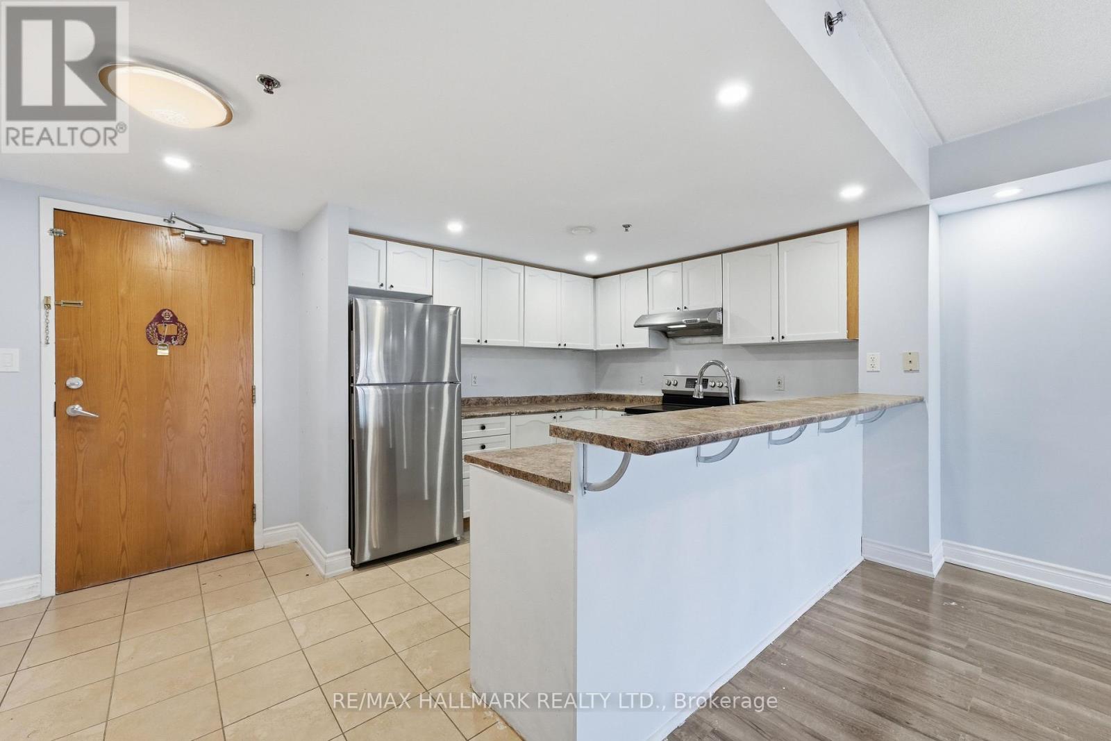 201 - 7428 MARKHAM ROAD