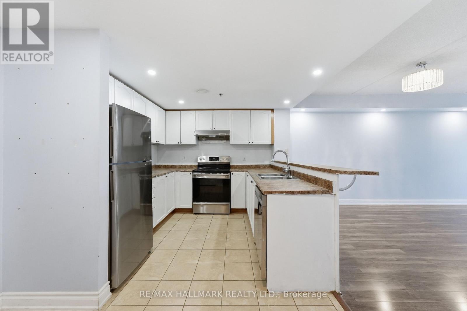 201 - 7428 MARKHAM ROAD