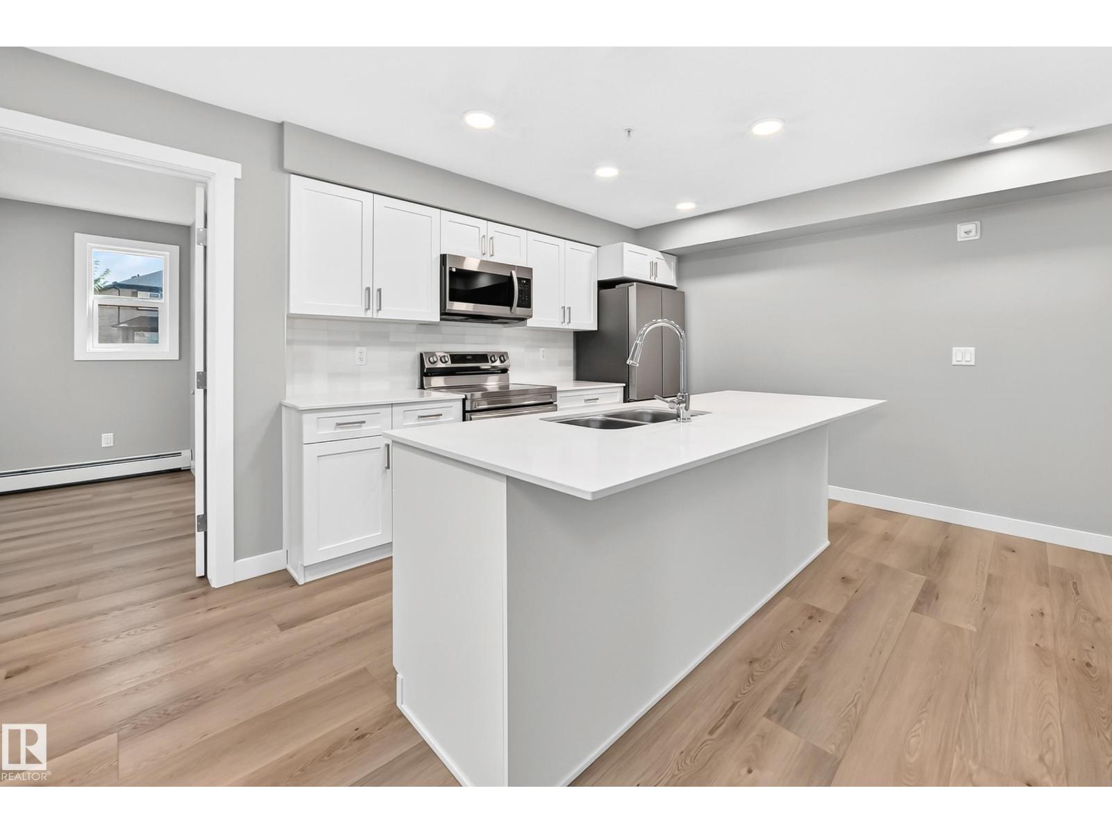 #128 1506 TAMARACK BV NW