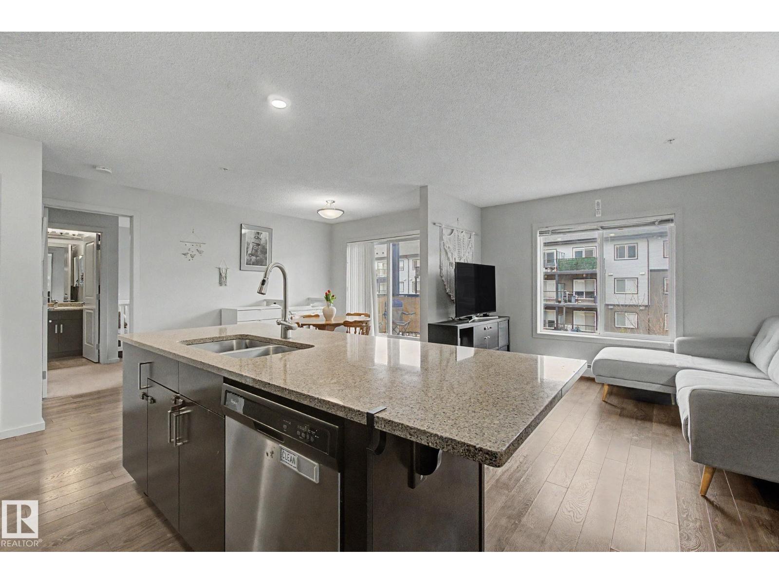 #330 390 Windermere RD NW