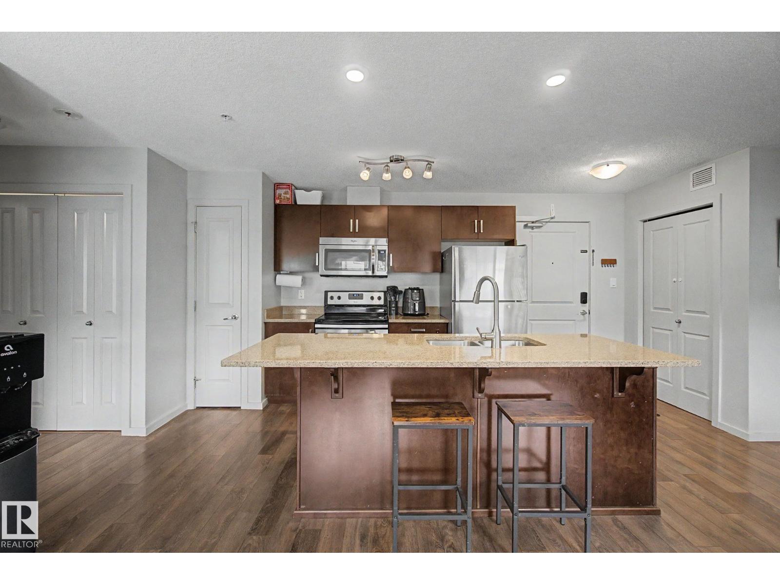 #330 390 Windermere RD NW