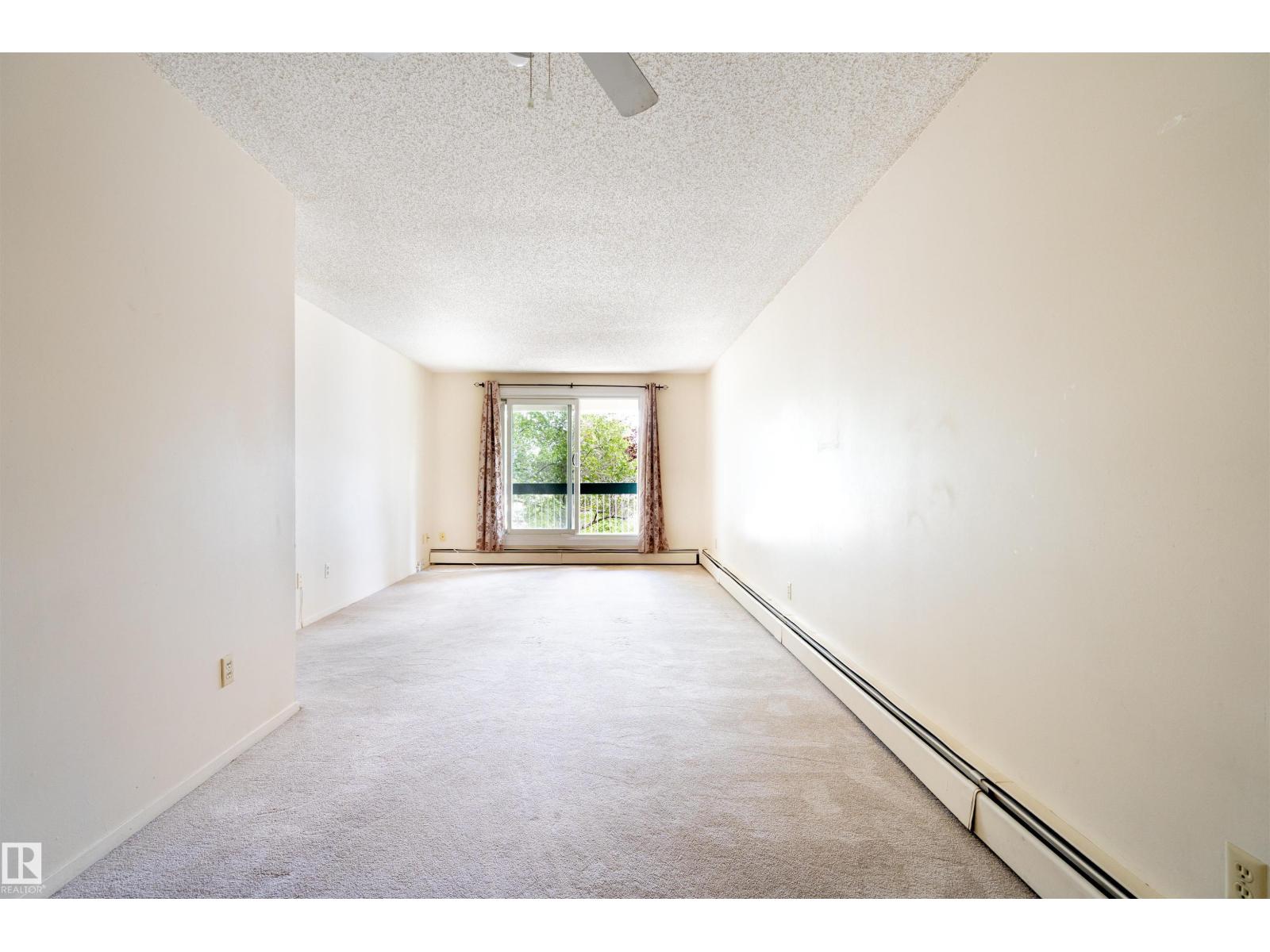 #203 1628 48 ST NW