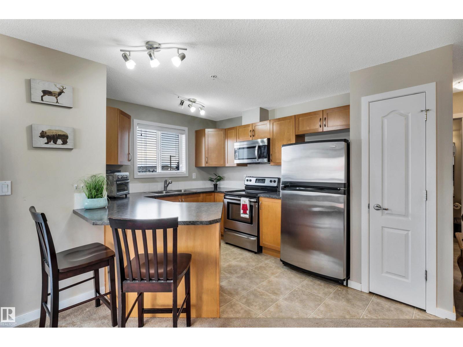 #215 392 SILVER BERRY RD NW