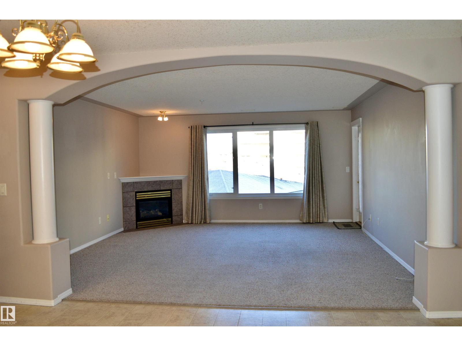 #322 237 YOUVILLE DR E NW