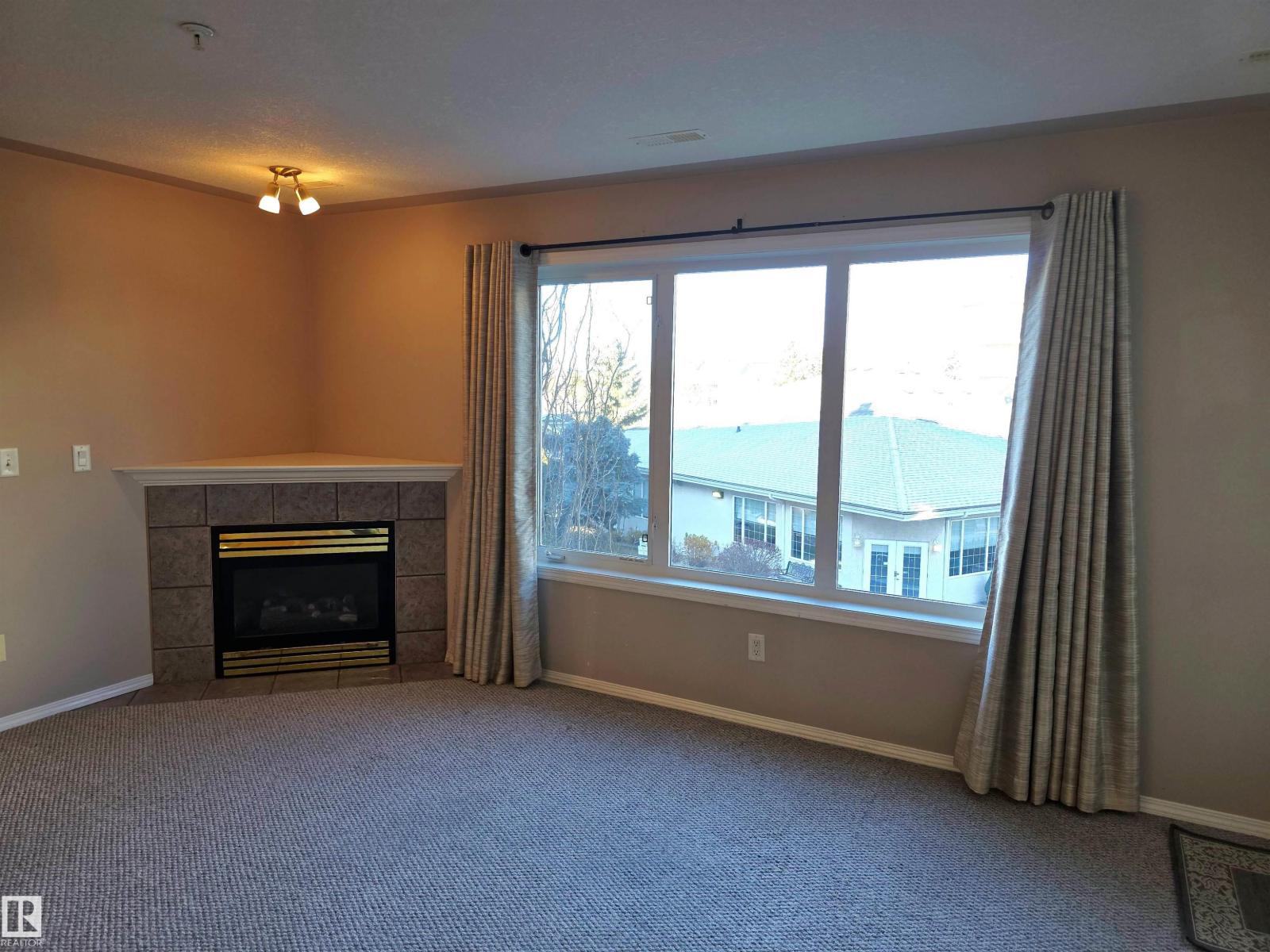 #322 237 YOUVILLE DR E NW