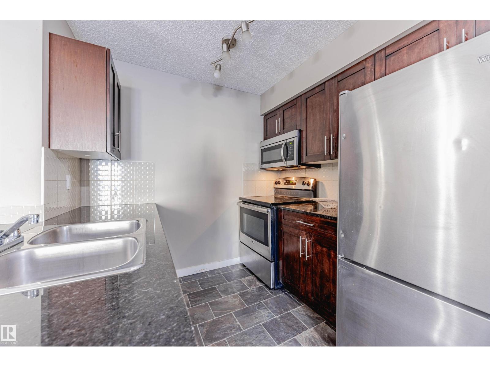 #202 5816 MULLEN PL NW