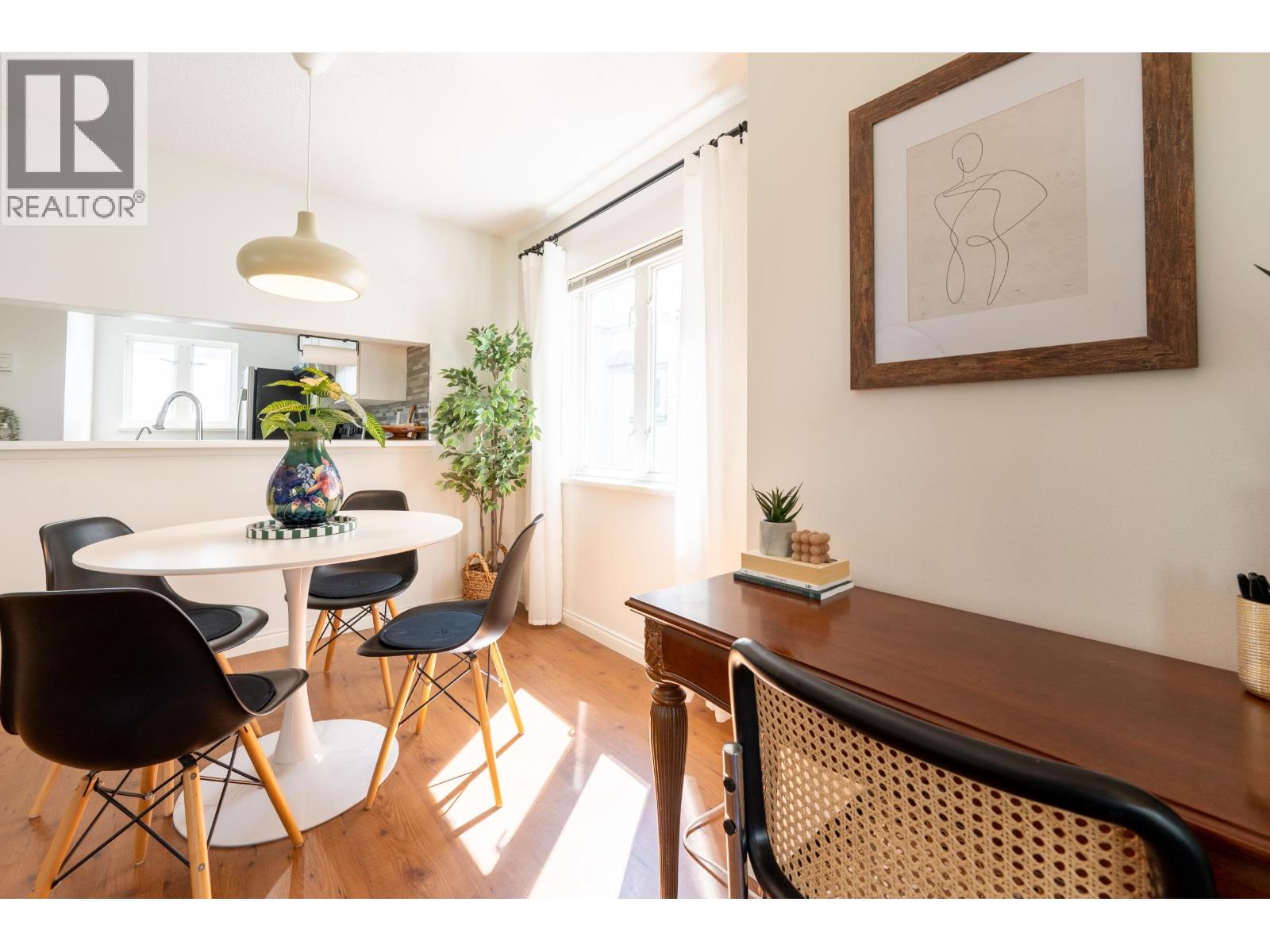 209 643 W 7TH AVENUE