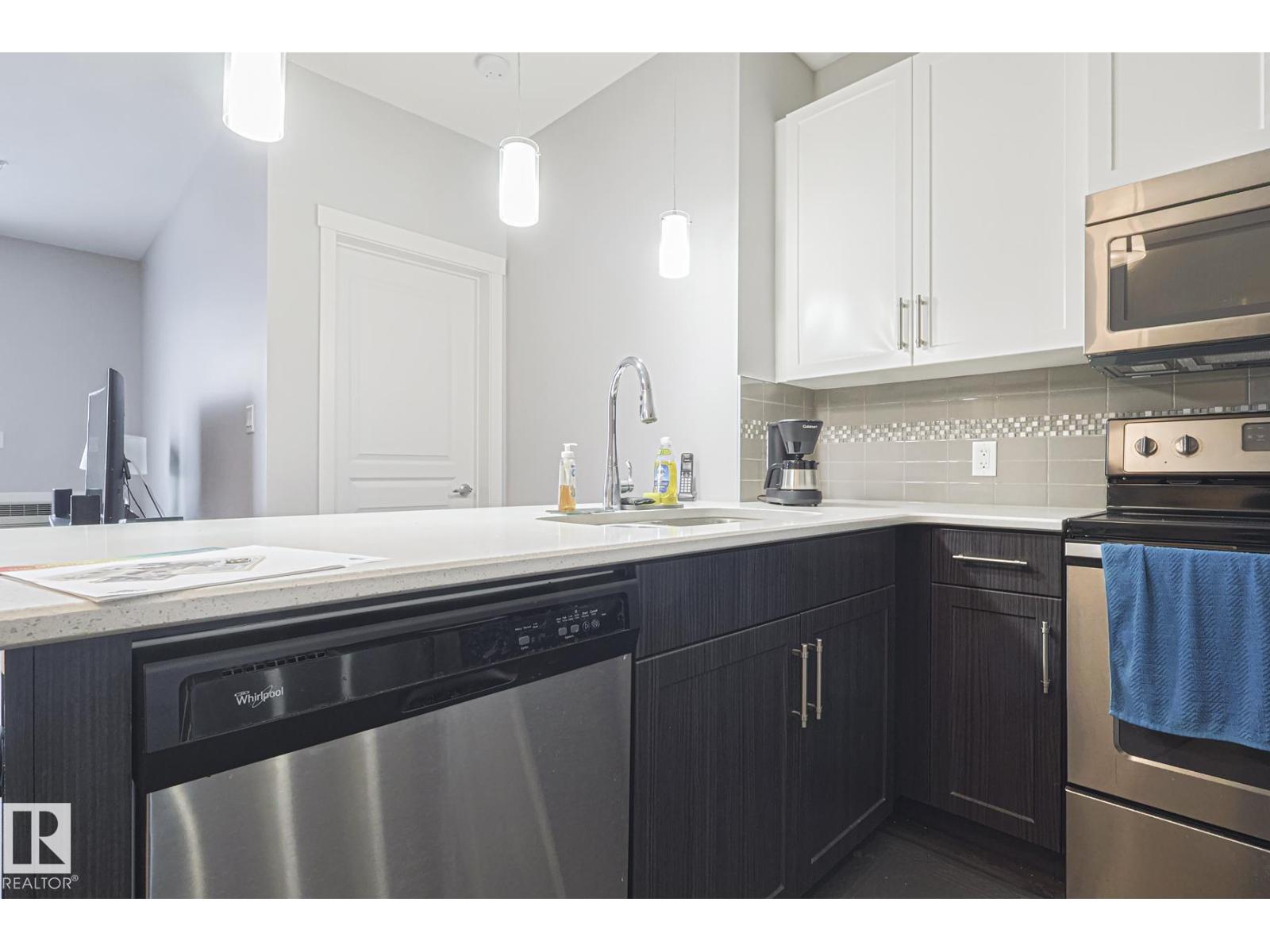 #407 812 WELSH DR SW