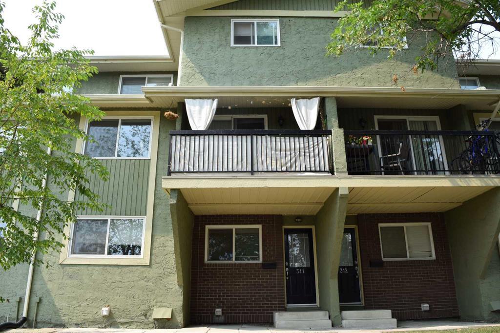 Photo 1 of 13 — 2200 Woodview Drive Southwest, Calgary, AB T2W3N6