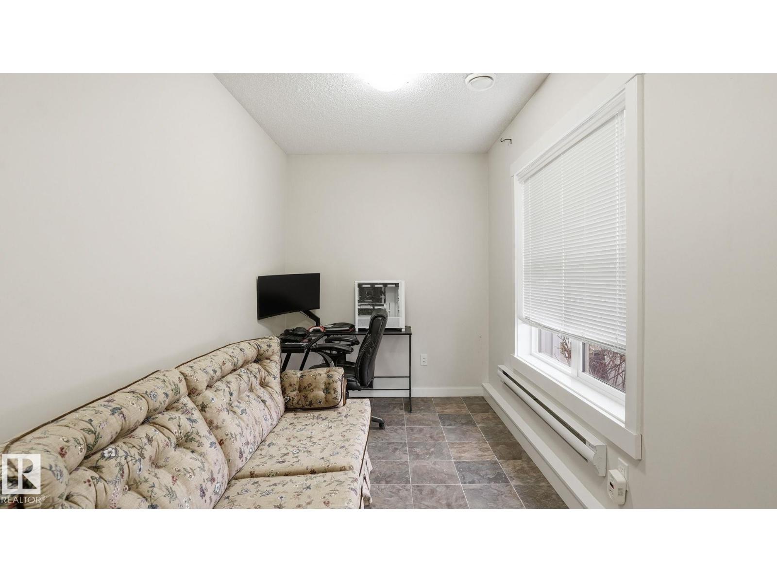#202 8530 94 ST NE