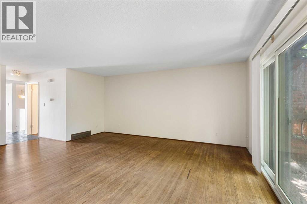 303, 1305 Glenmore Trail SW