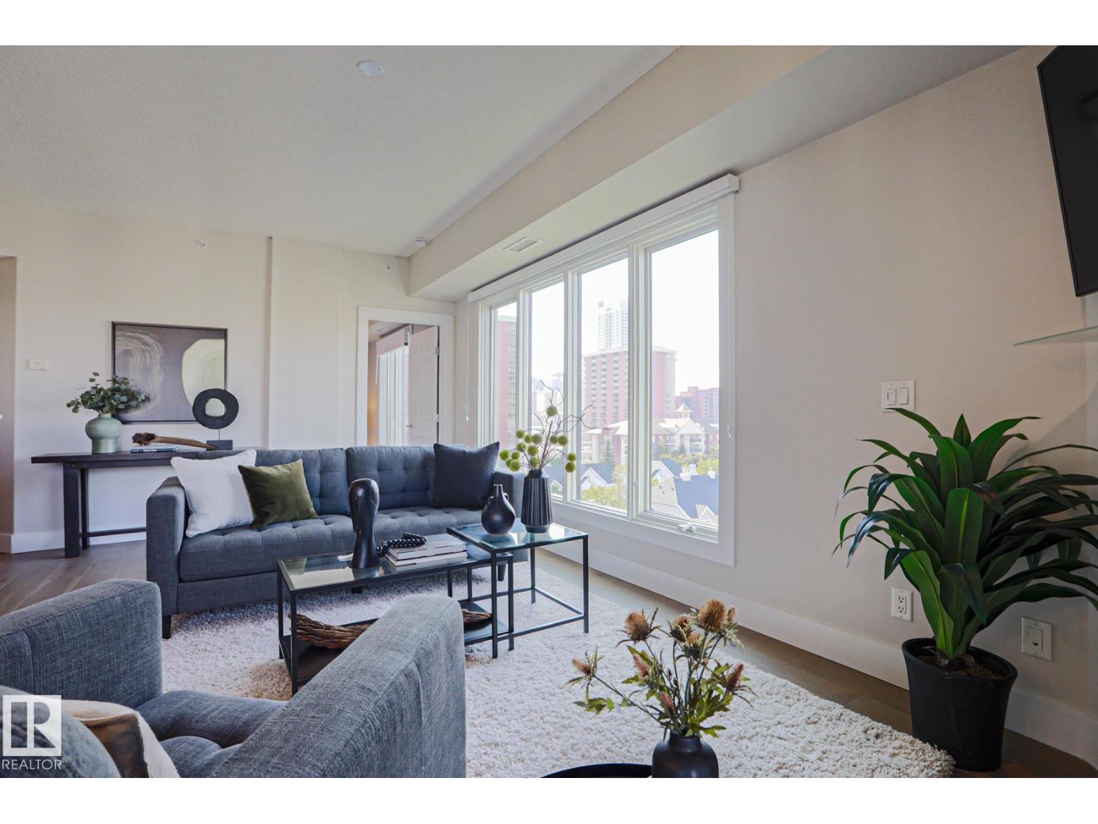 #703 10303 111 ST NW