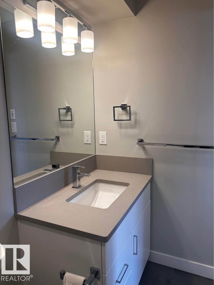 #103 10736 116 ST NW