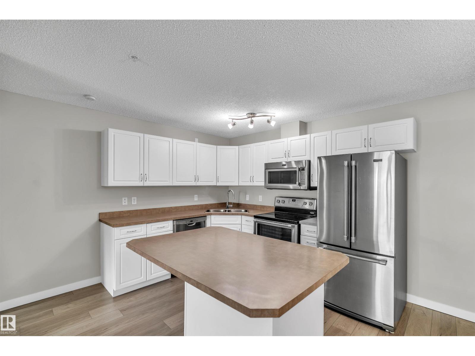 #303 279 Suder Greens Dr NW NW