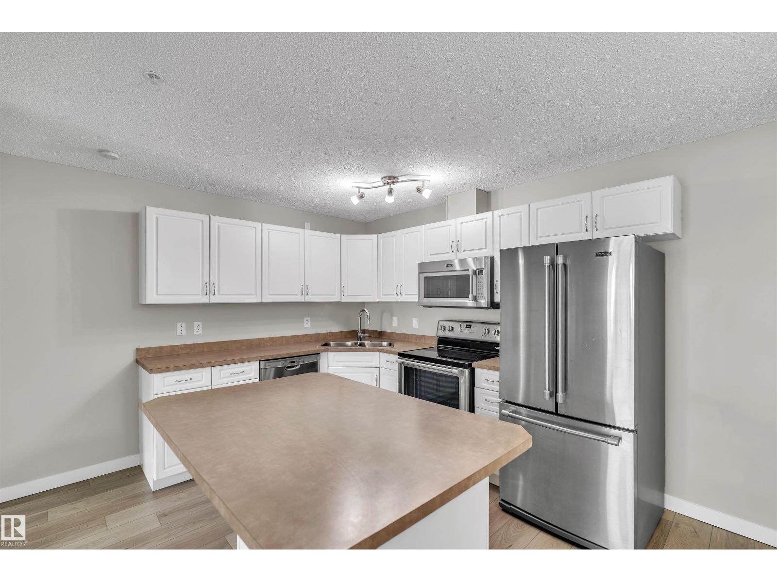 #303 279 Suder Greens Dr NW NW
