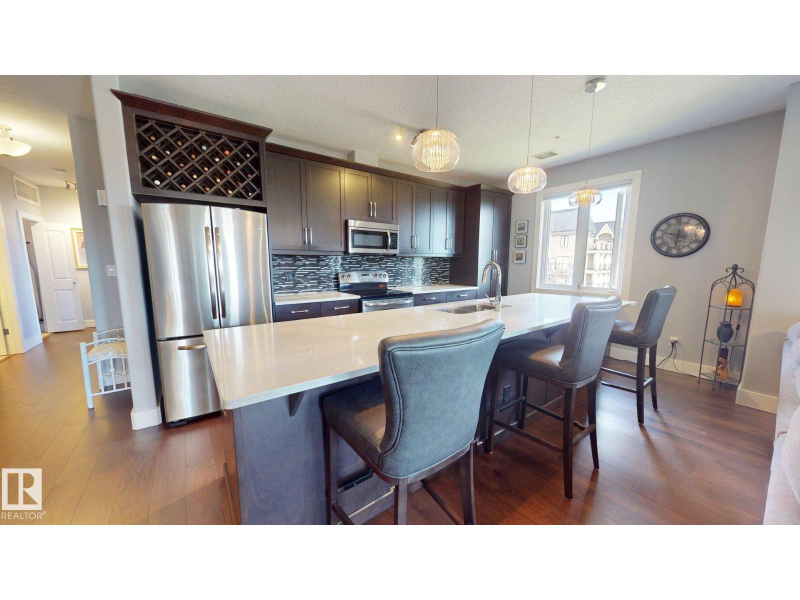 #355 6079 Maynard WY NW
