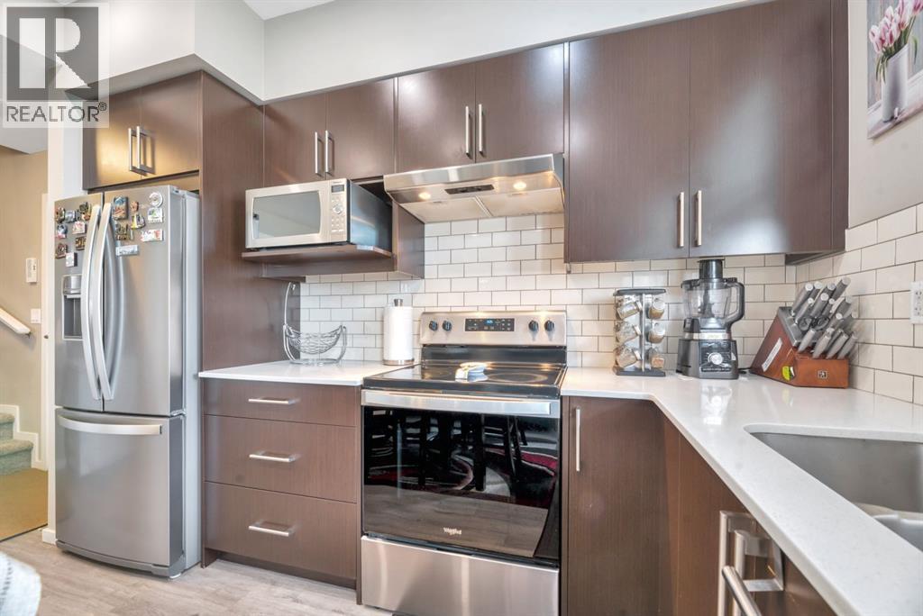 201, 235 Redstone Walk NE