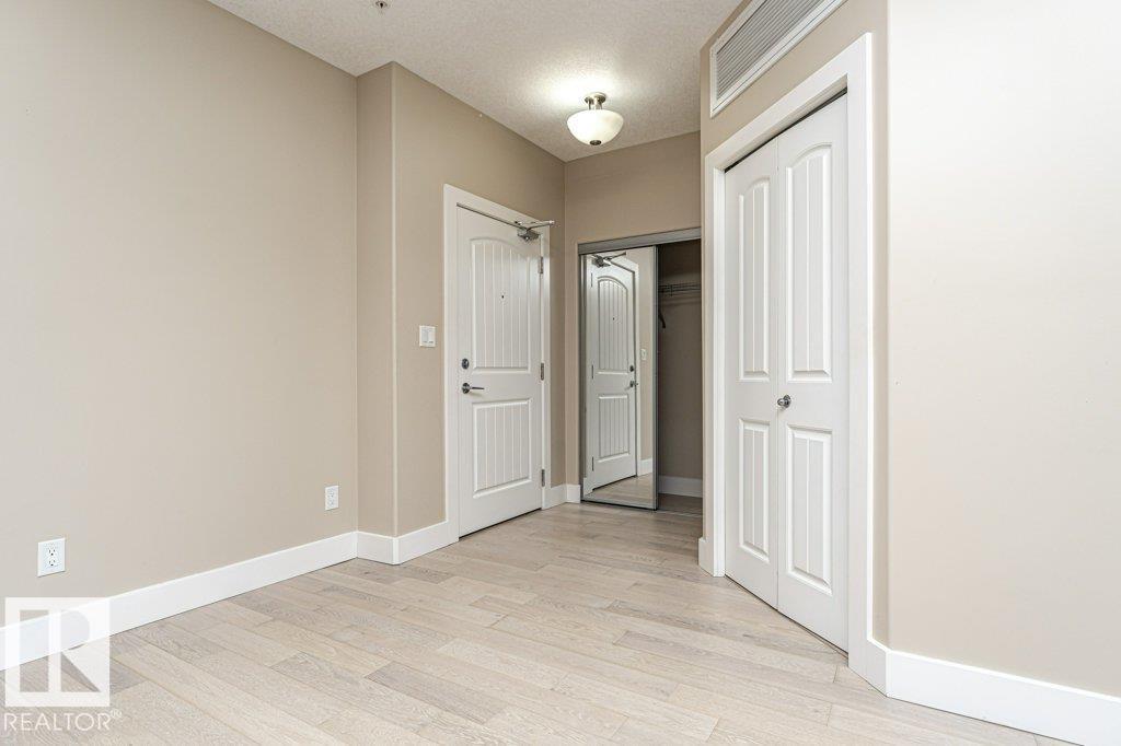 #256 6079 MAYNARD WY NW