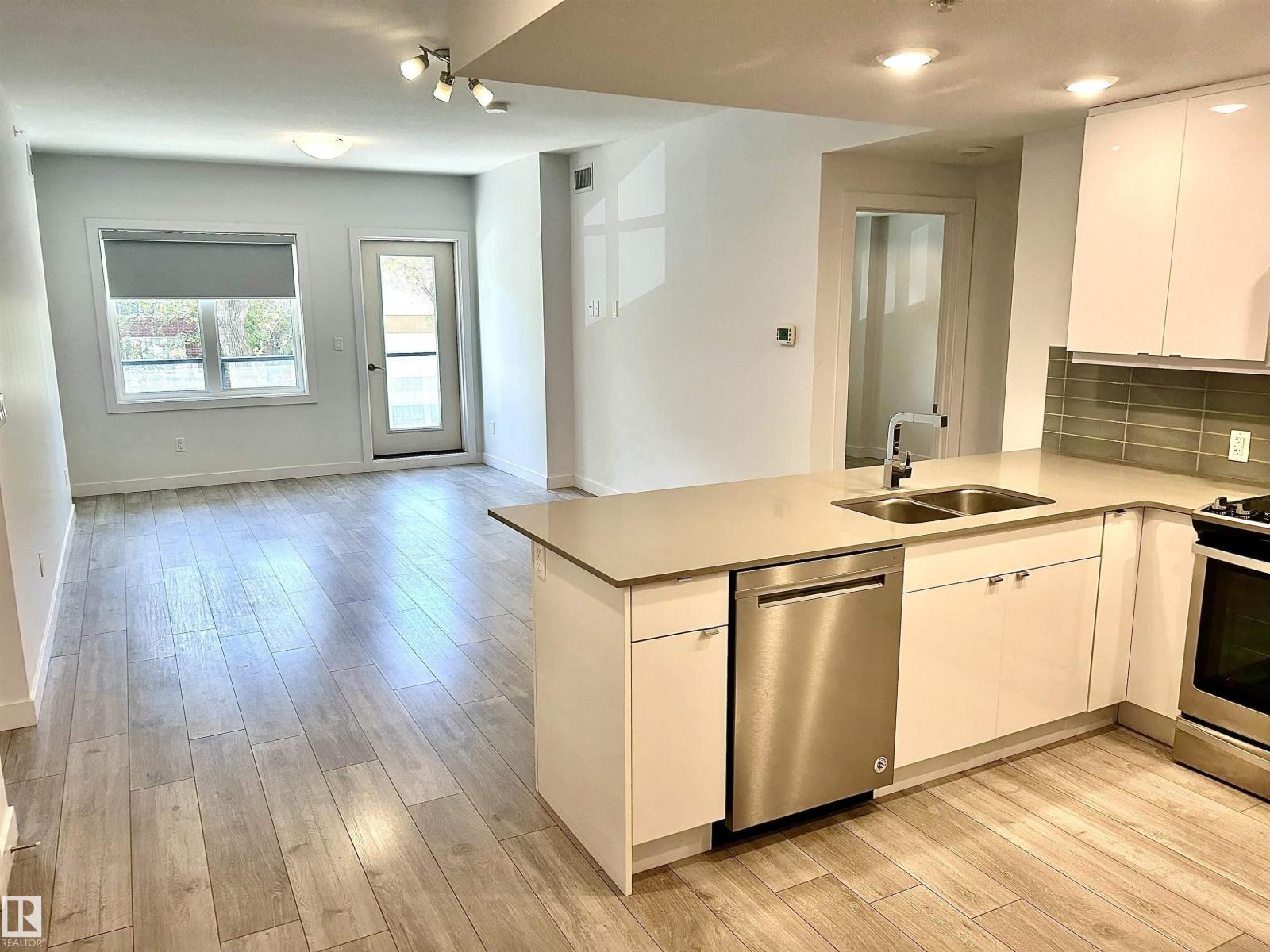 #203 8510 90 ST NW