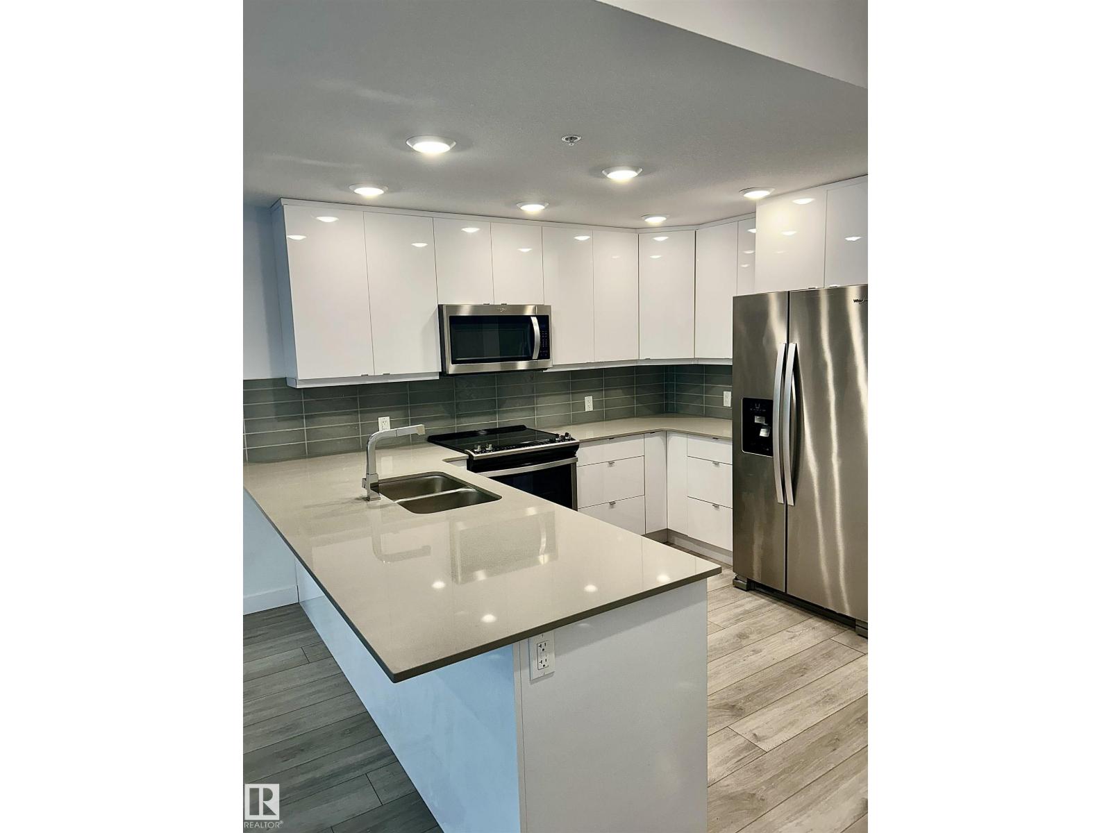 #203 8510 90 ST NW