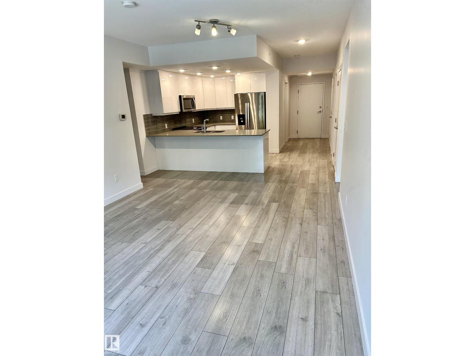 #203 8510 90 ST NW