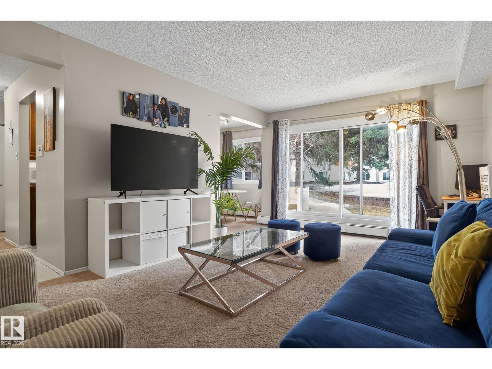 #120 5730 RIVERBEND RD NW