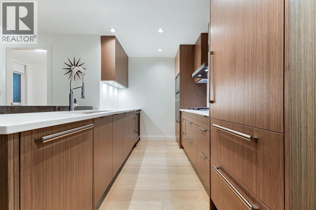 104, 128 Waterfront Court SW