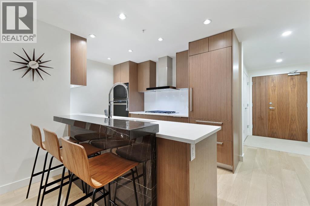 104, 128 Waterfront Court SW