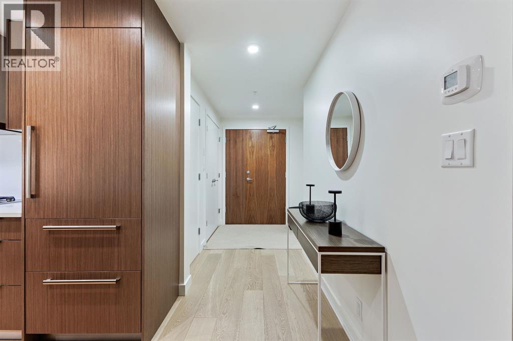 104, 128 Waterfront Court SW
