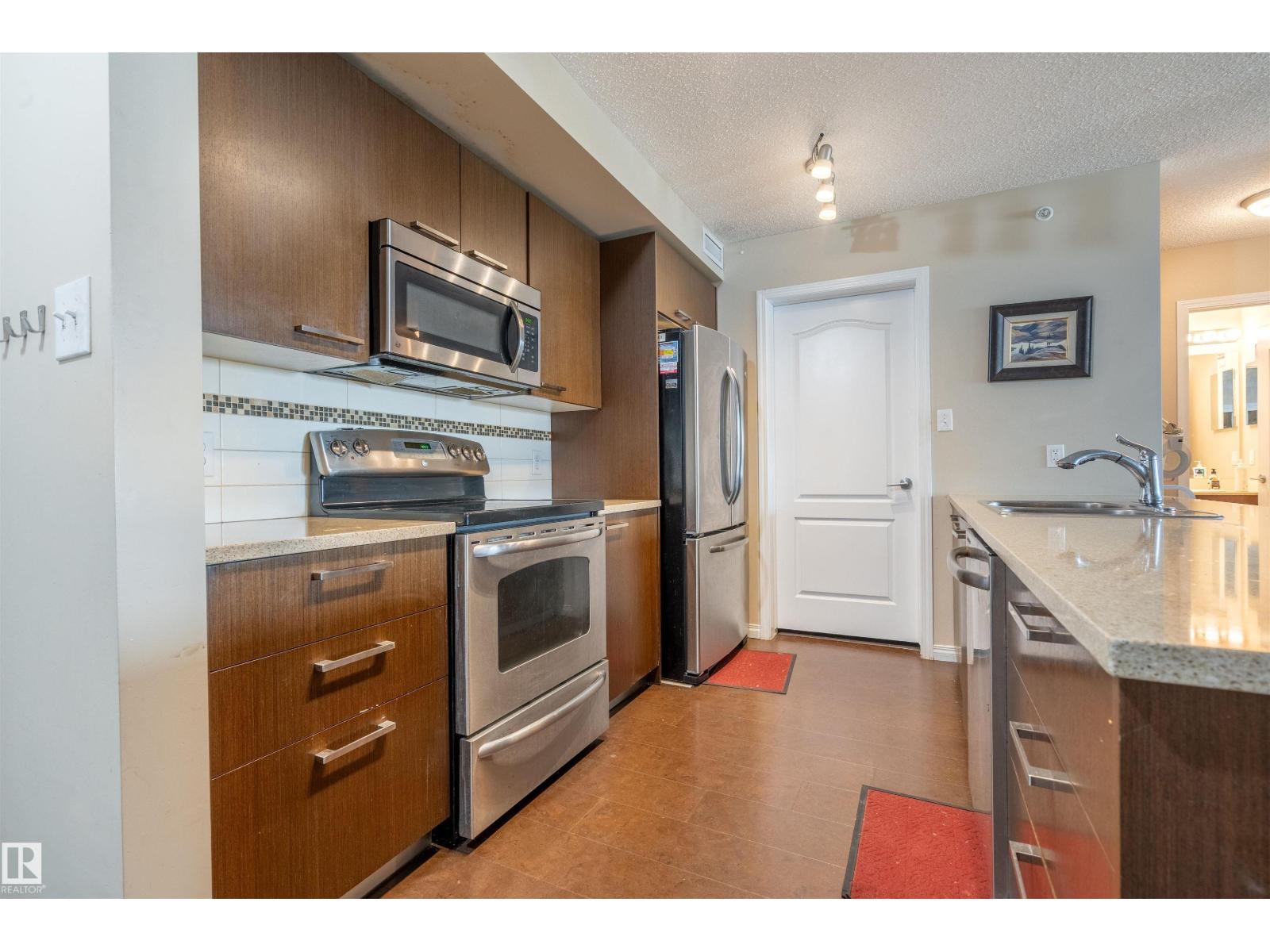 #2401 7343 SOUTH TERWILLEGAR DR NW
