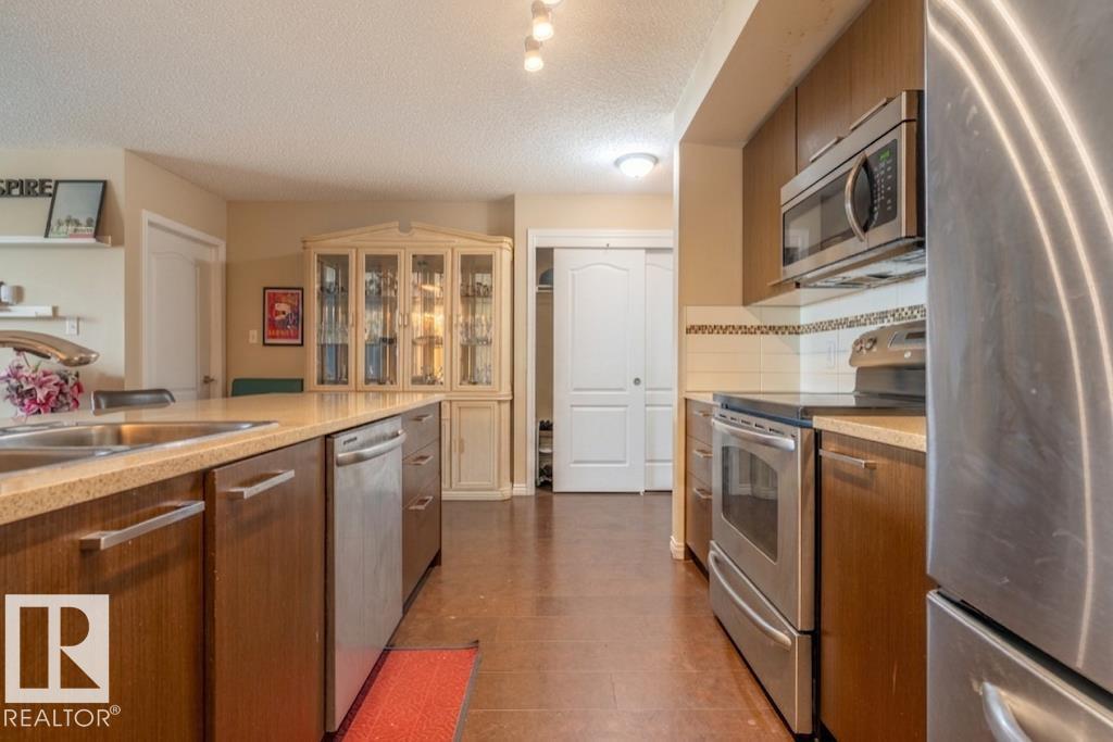 #2401 7343 SOUTH TERWILLEGAR DR NW