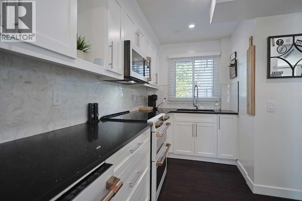 205, 310 Falconridge Crescent NE