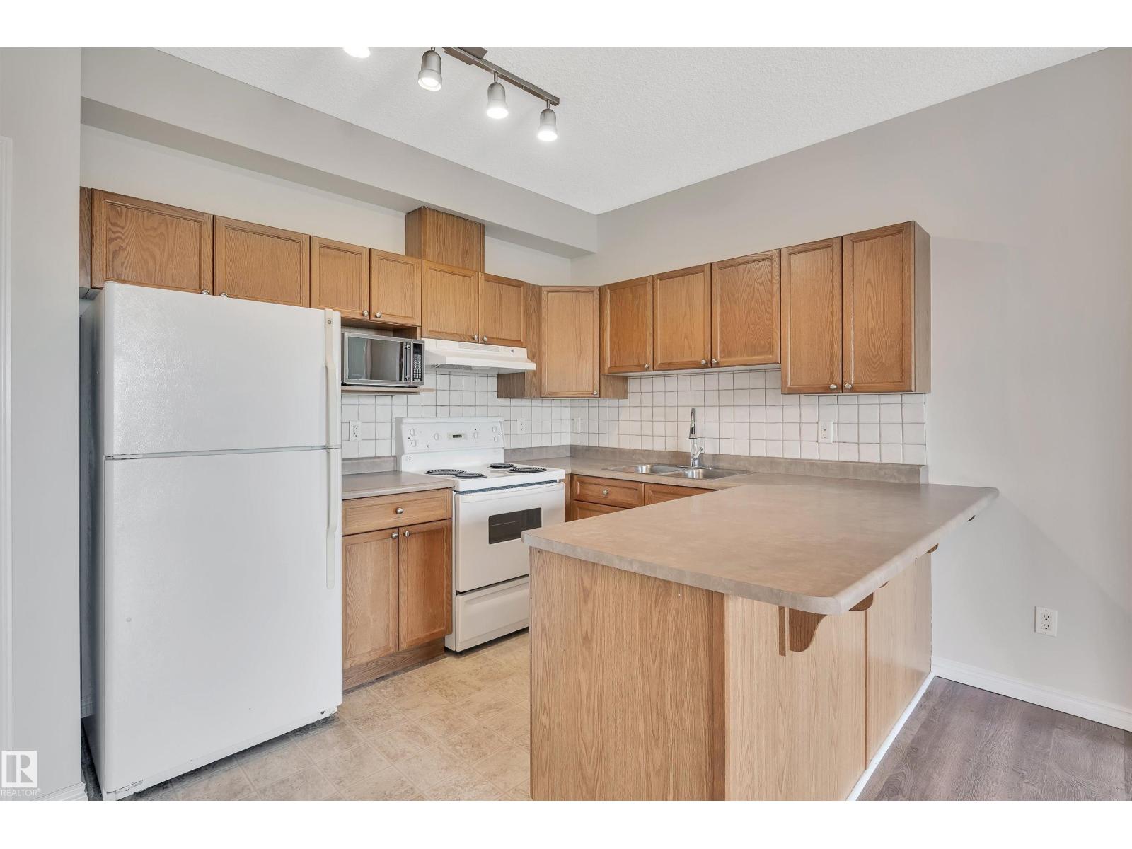 #308 10118 95 ST NW