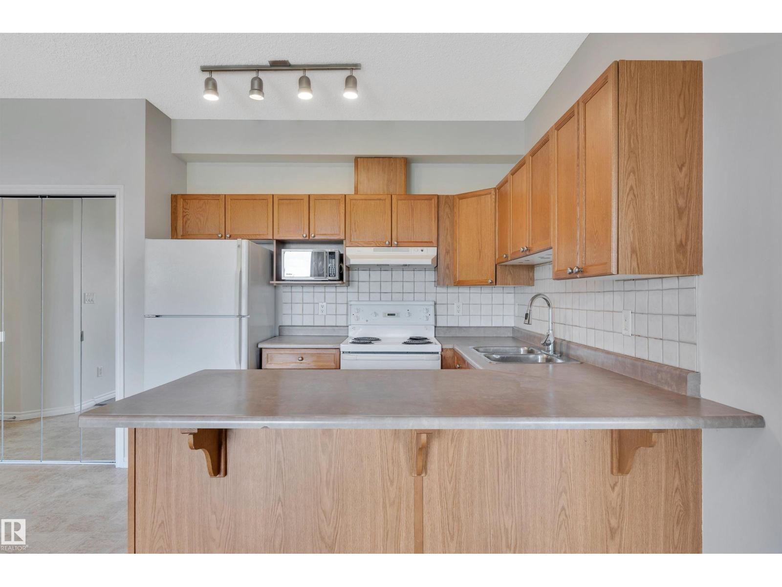 #308 10118 95 ST NW