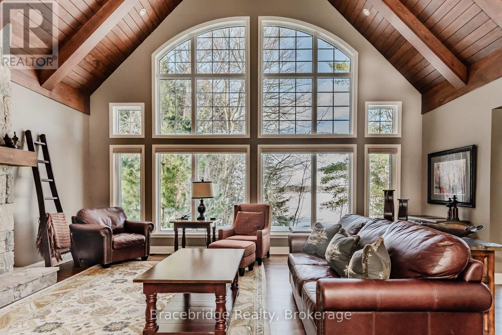 Photo 1 of 40 — WATER'S EDGE W1 - 3876 MUSKOKA RD 118 HIGHWAY W, Muskoka Lakes (Medora), ON P0B1J0
