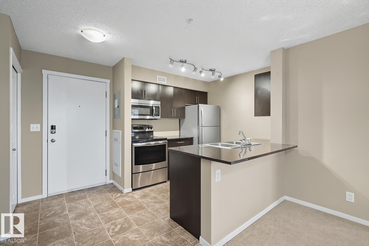 #205 5810 MULLEN PL NW