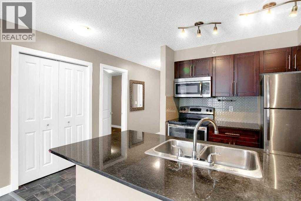 9407, 403 Mackenzie Way SW